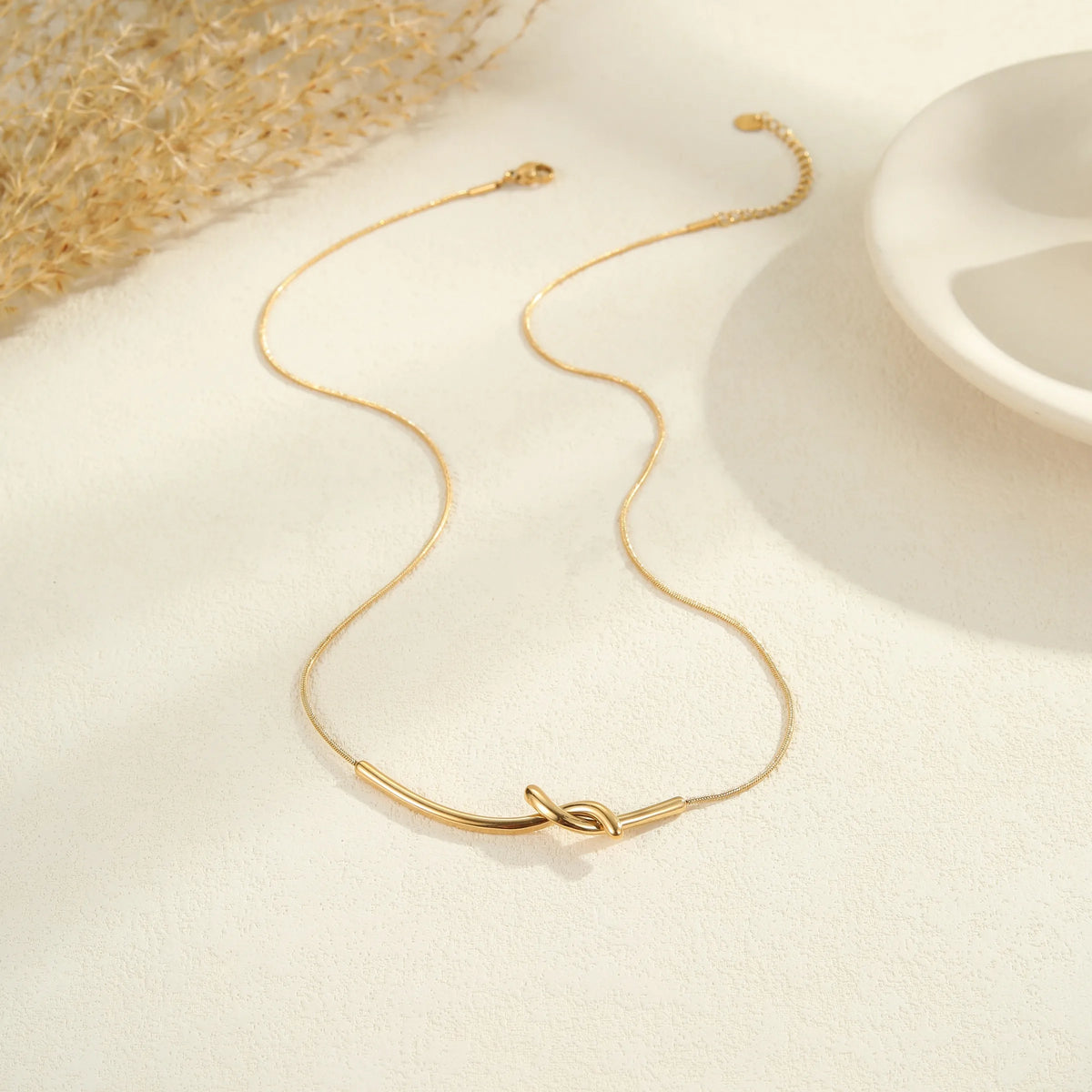 The Elodie Sculpted Infinity Knot Pendant Necklace