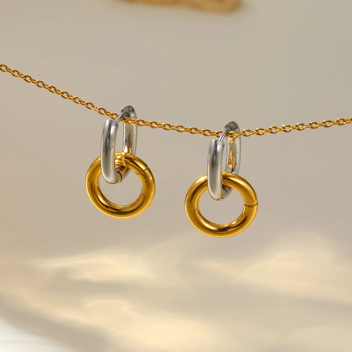 The Margot Waterproof Mixed-Metal Interlocking Hoops