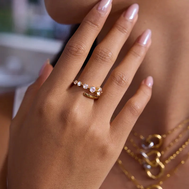 The Lyra Waterproof 18K Gold Graduated Starburst Bypass Ring
