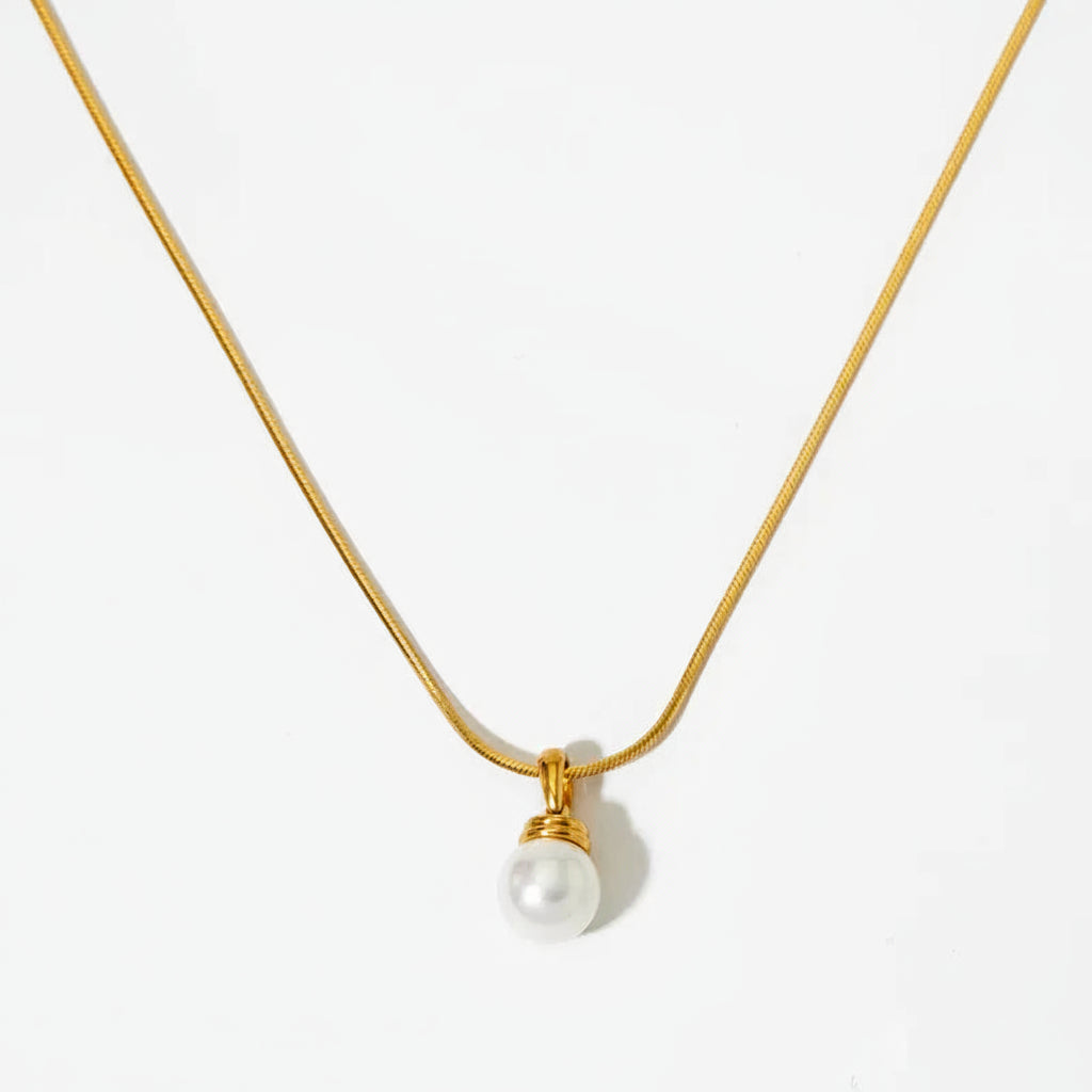 The Celine Liquid Snake Chain Pearl Solitaire Necklace