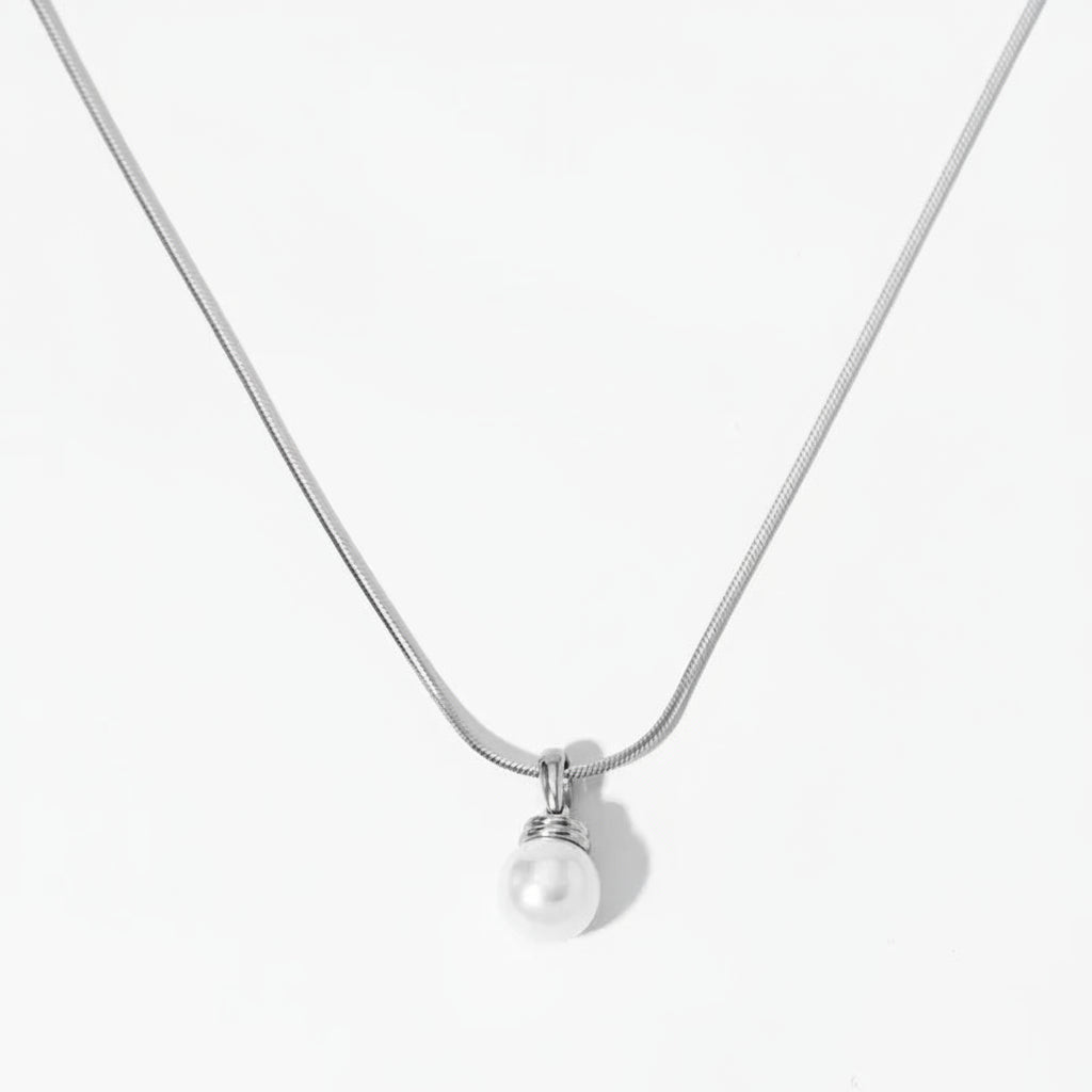 The Celine Liquid Snake Chain Pearl Solitaire Necklace