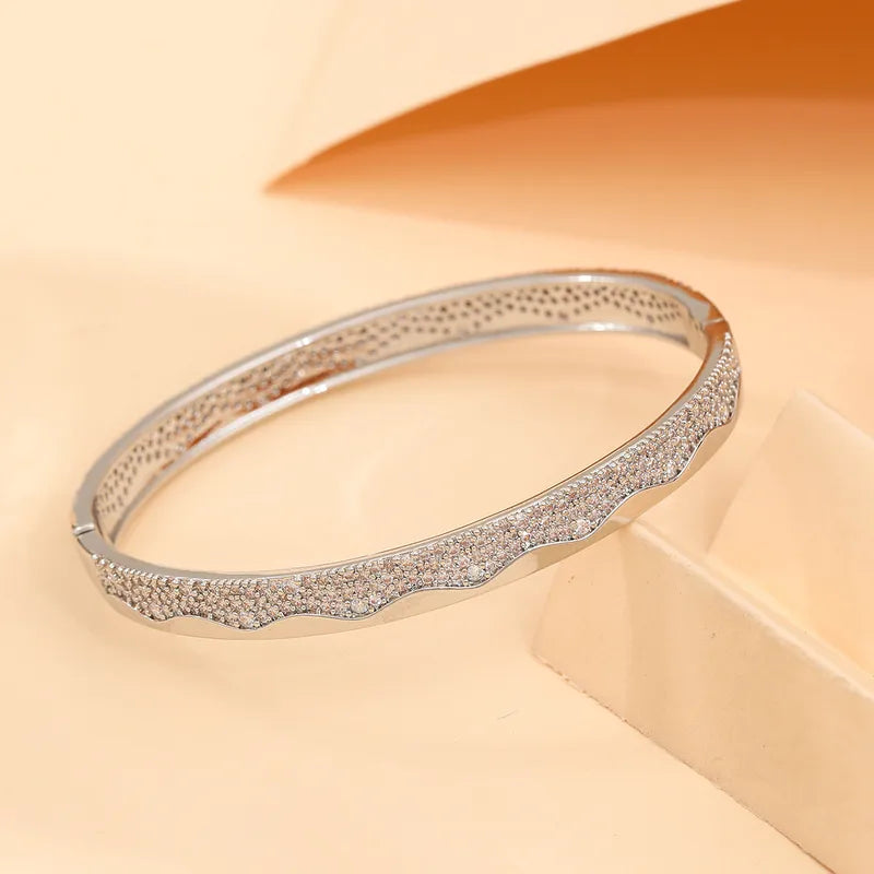 The Riviera Wavy Pavé Bangle | Premium Zircon
