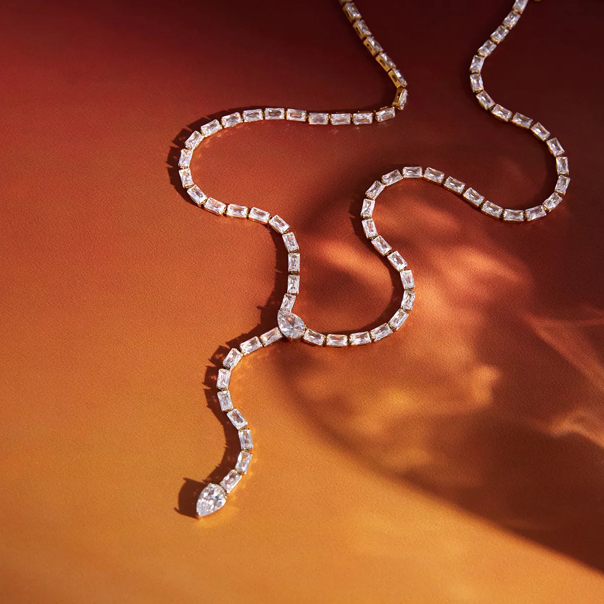 The Ice-Carat PVD Gold Zircon Tennis Drop Lariat