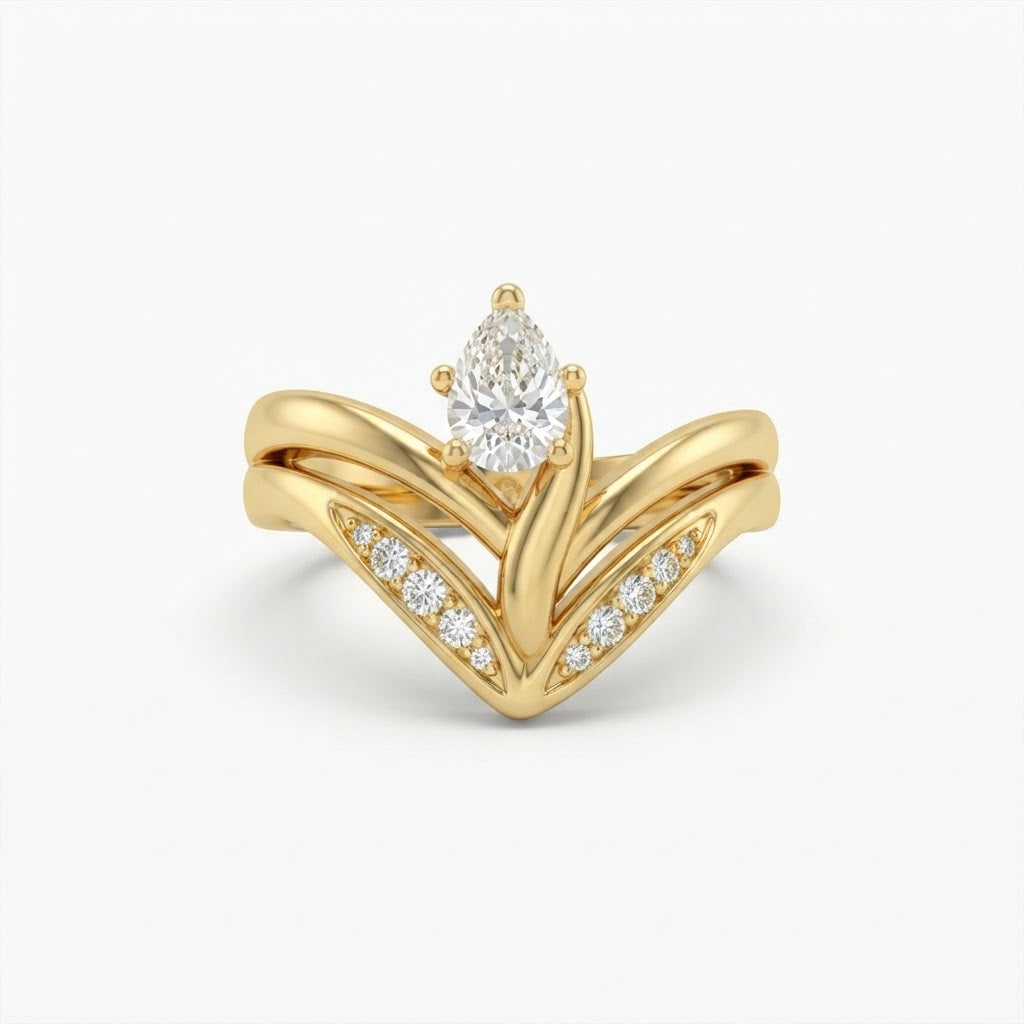 The Esme 18K Gold Emerald Pear Bypass Ring