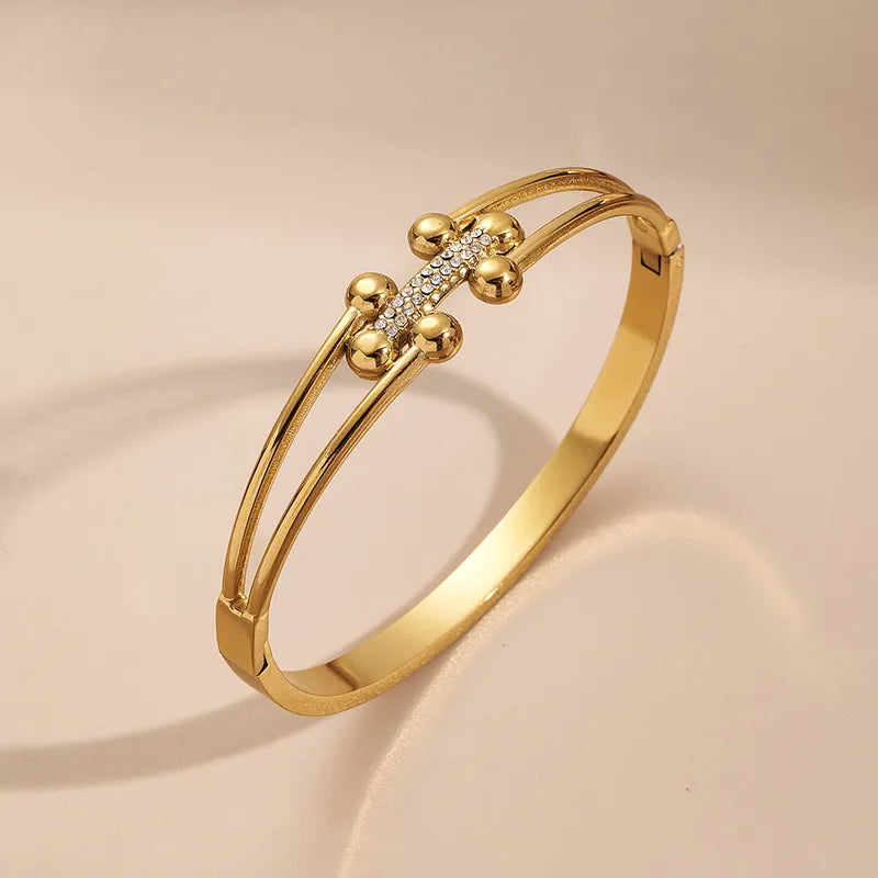 The Aurelia Screw-Link Bangle | 18K Gold PVD