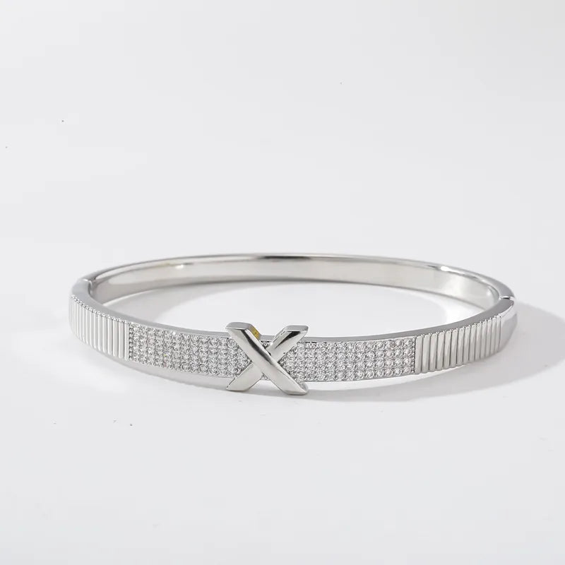 The Nexus Platinum-Tone Zircon Emblem Bangle