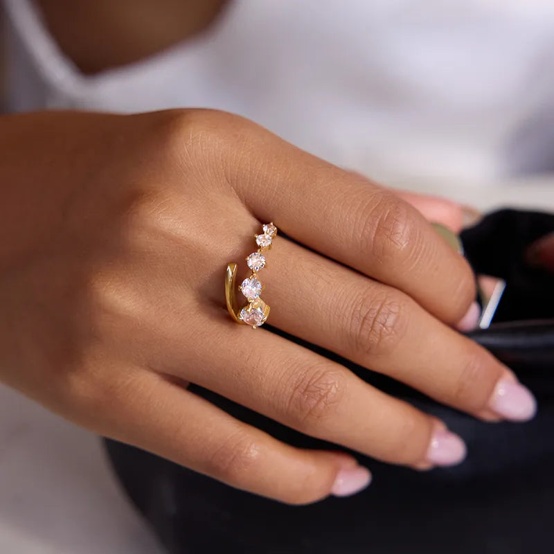 The Lyra Waterproof 18K Gold Graduated Starburst Bypass Ring