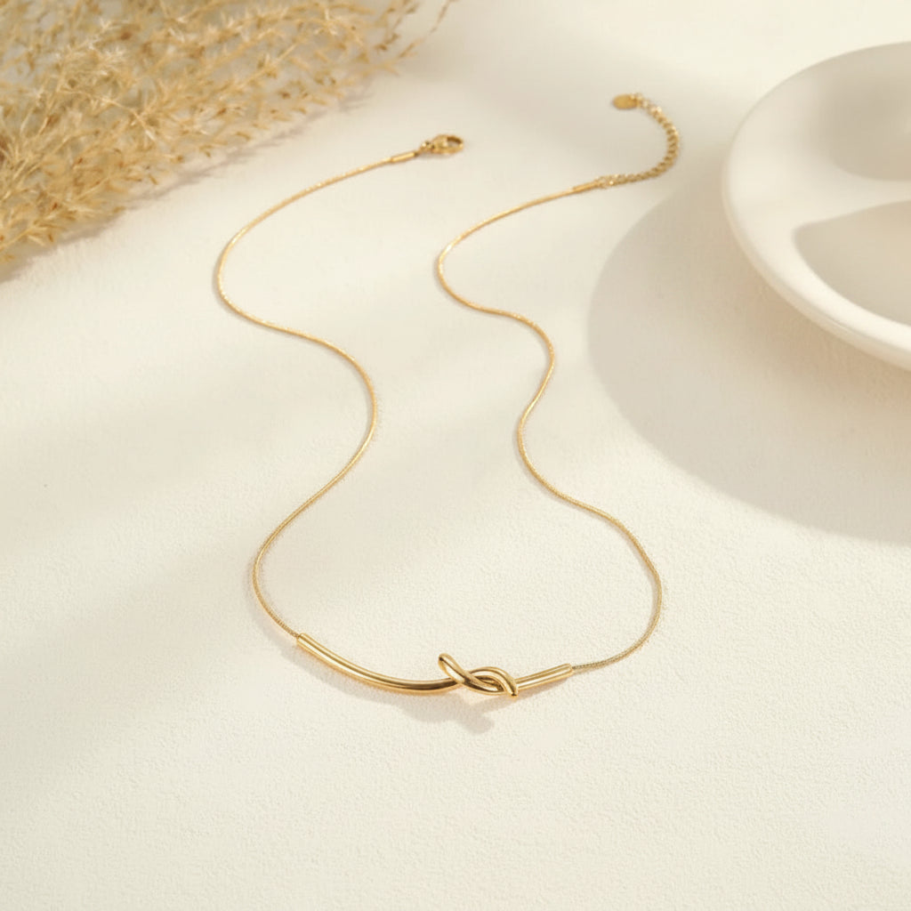The Elodie Sculpted Infinity Knot Pendant Necklace