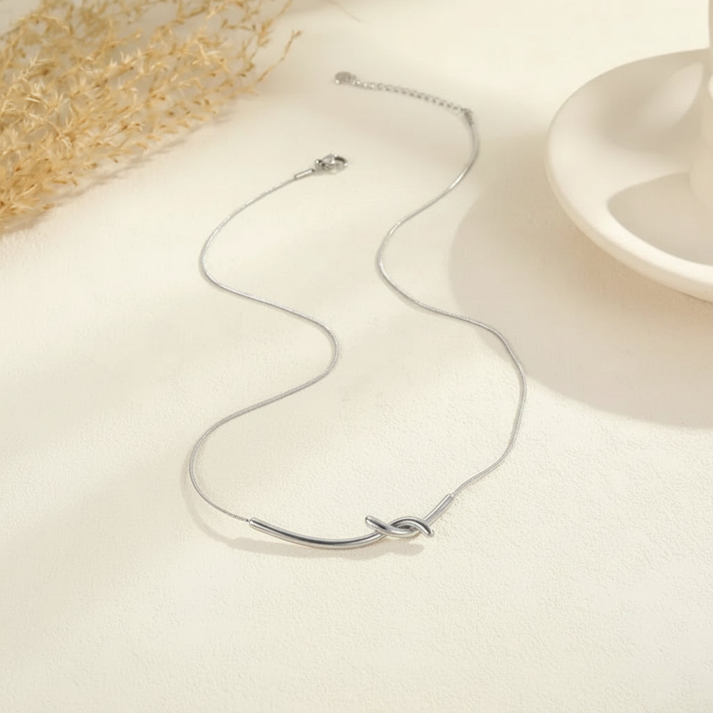The Elodie Sculpted Infinity Knot Pendant Necklace
