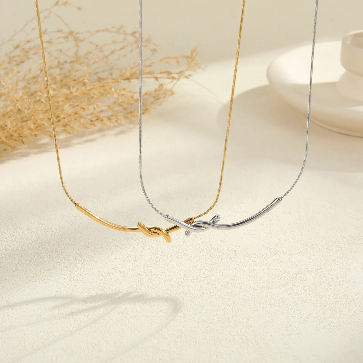 The Elodie Sculpted Infinity Knot Pendant Necklace