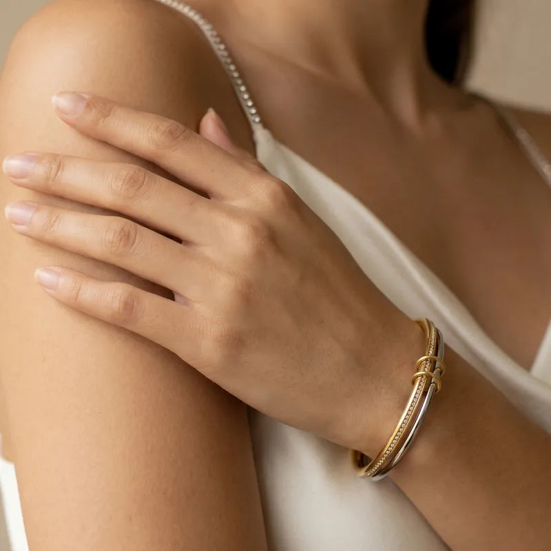 The Trinity Interlocking Two-Tone Bangle | 18K Gold PVD