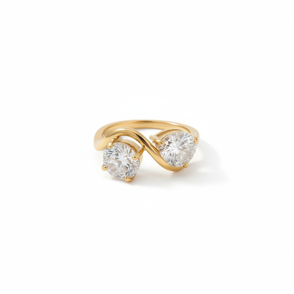 The Lyra Gold PVD Coated Fluid Water Drop Claw Ring