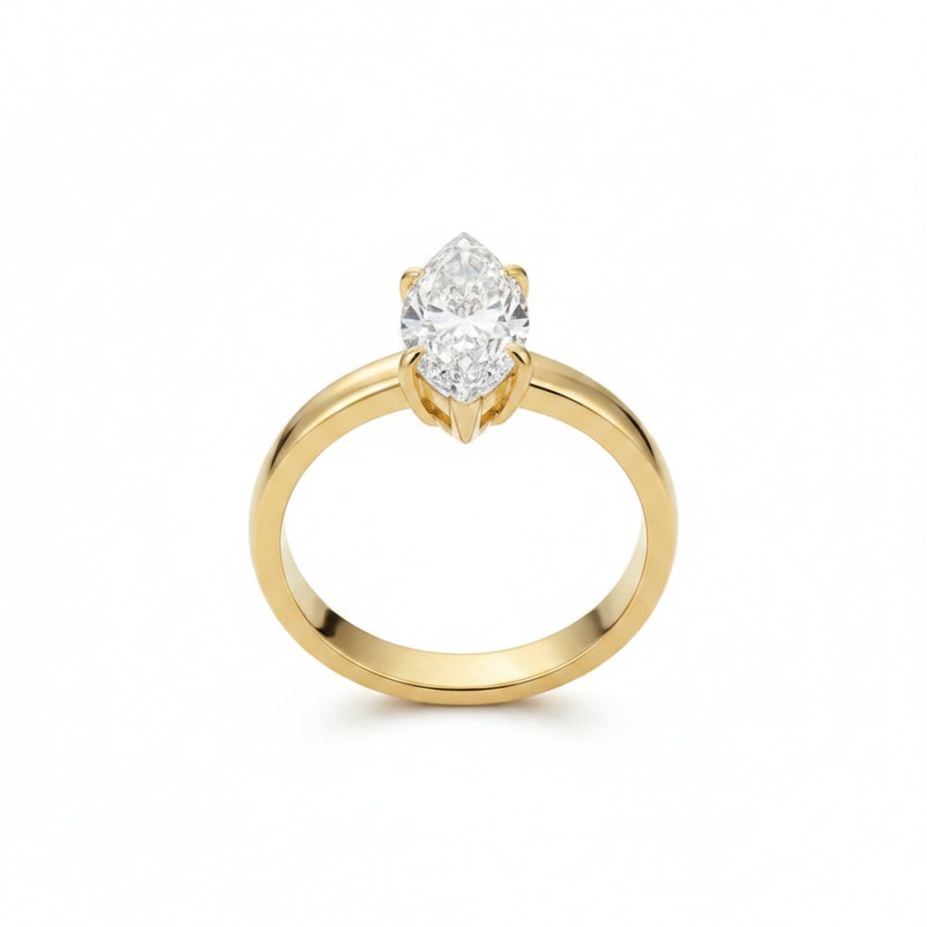 The Lyra Gold PVD Coated Fluid Water Drop Claw Ring