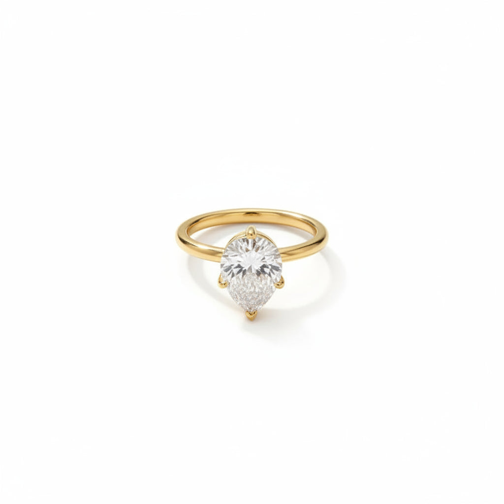 The Lyra Gold PVD Coated Fluid Water Drop Claw Ring