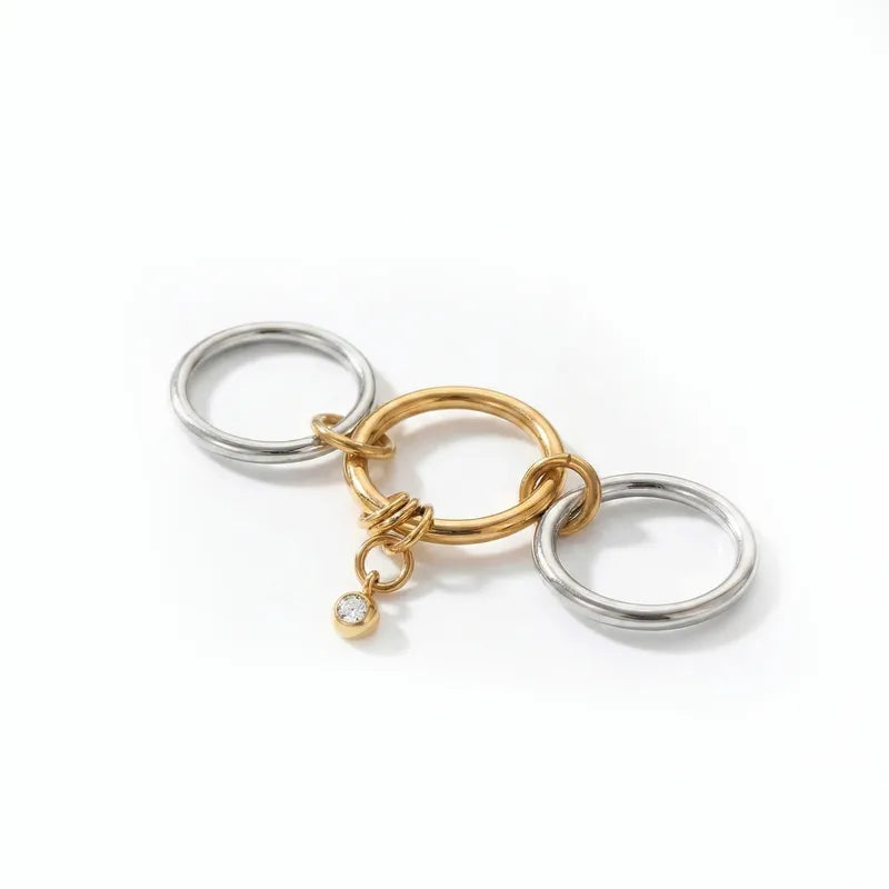 The Interlocking Mixed-Metal 18K Gold Three-Layer Dangle Ring