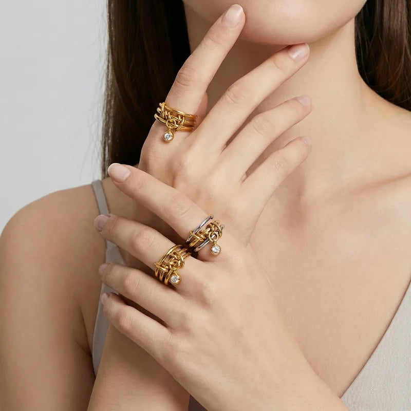 The Interlocking Mixed-Metal 18K Gold Three-Layer Dangle Ring