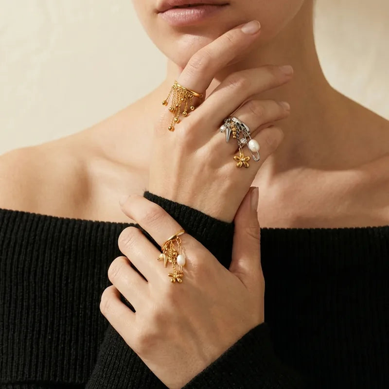 The Lyra Waterproof Gold Mixed Charm Tassel Ring